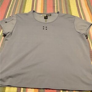 Jamie’s a dock short sleeve blue shirt.